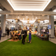 Membership perks include a bocce ball court (don’t worry, the grass is fake)…
